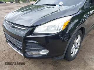 2013 Ford Escape SE with VIN 1FMCU0GX4DUC40277, listed as a IAAI auction lot 42201196 with 46,157 mi miles and . Bid and sale history available at carsss.com. Image 6.