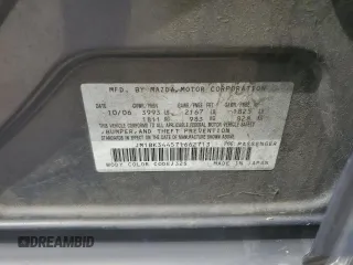 2007 Mazda 3 S Touring z VIN JM1BK344571662713, wystawiony jako Copart lot #59407825 z przebiegiem 107 723 mil mil oraz Szkoda całkowita • Salvage title. Historia ofert i sprzedaży dostępna na DreamBid. Obrazek 12.