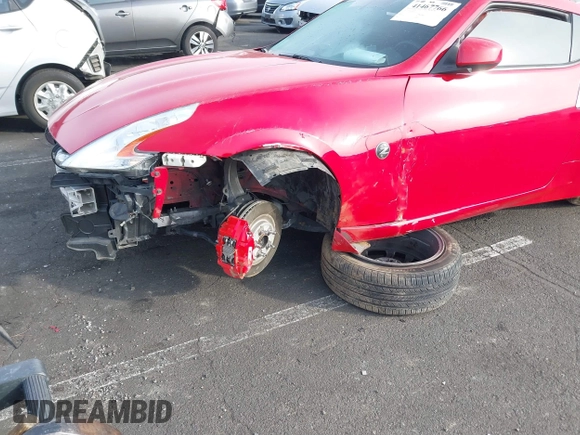 2014 Nissan 370Z Nismo with VIN JN1AZ4EH9EM636306, listed as a IAAI auction lot 41467766 with 101,021 mi miles and . Bid and sale history available at DreamBid. Image 6.