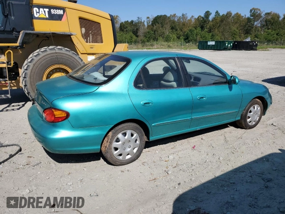 2000 Hyundai Elantra GLS z VIN KMHJF35FXYU998689, wystawiony jako Copart lot #76181814 z przebiegiem 154 743 mil mil oraz Szkoda całkowita • Salvage title. Historia ofert i sprzedaży dostępna na DreamBid. Obrazek 3.