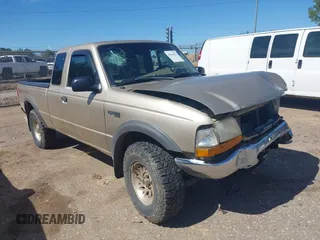 1999 Ford Ranger XL with VIN 1FTZR15V8XTB07717, listed as a IAAI auction lot 41661032 with 161,889 mi miles. Bid and sale history available at carsss.com. Image 13.