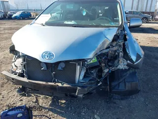 2014 Toyota Sienna SE with VIN 5TDXK3DC3ES471496, listed as a IAAI auction lot 41665914 with Not Provided miles and . Bid and sale history available at DreamBid. Image 6.