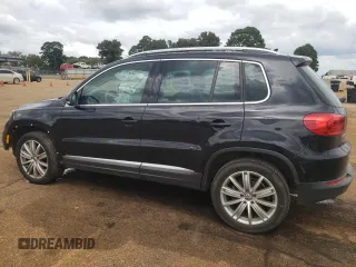 2014 Volkswagen Tiguan SEL with VIN WVGAV3AX5EW558929, listed as a Copart auction lot 71004684 with 125,628 mi miles and Clean title. Bid and sale history available at DreamBid. Image 2.