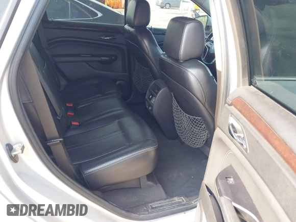 2014 Cadillac SRX Luxury Collection z VIN 3GYFNEE36ES652353, wystawiony jako IAAI lot #42233986 z przebiegiem 146 029 mil mil oraz . Historia ofert i sprzedaży dostępna na DreamBid. Obrazek 8.