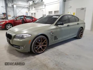 2011 BMW 5 Series 550i with VIN WBAFR9C55BC270884, listed as a Copart auction lot 65214165 with 238,207 mi miles and Clean title. Bid and sale history available at DreamBid. Image 1.
