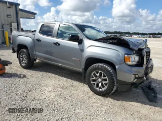 2021 GMC Canyon 4WD AT4 w/Cloth with VIN 1GTG6FEN9M1186142, listed as a Copart auction lot 80284954 with 29,663 mi miles and Non Repairable. Bid and sale history available at carsss.com. Image 4.