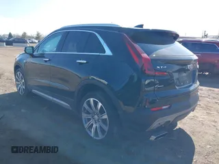 2023 Cadillac XT4 AWD Premium Luxury with VIN 1GYFZDR46PF195391, listed as a IAAI auction lot 41848429 with 31,904 mi miles and . Bid and sale history available at carsss.com. Image 3.
