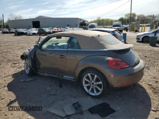 2014 Volkswagen Beetle 2.0L TDI с VIN 3VW6L7ATXEM809087, выставлен на аукционе Copart как лот 53710365 с пробегом Не указан миль и Списание • Salvage title. История ставок и продаж доступна на DreamBid. Изображение 2.