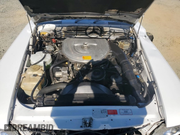 1988 Mercedes-Benz 560 SL z VIN WDBBA48D1JA078995, wystawiony jako Copart lot #89274725 z przebiegiem 119 355 mil mil oraz Szkoda całkowita • Salvage title. Historia ofert i sprzedaży dostępna na DreamBid. Obrazek 11.