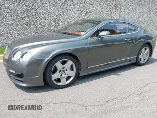 2005 Bentley Continental GT GT z VIN SCBCR63W45C024347, wystawiony jako IAAI lot #42425201 z przebiegiem 97 414 mil mil oraz . Historia ofert i sprzedaży dostępna na DreamBid. Obrazek 2.