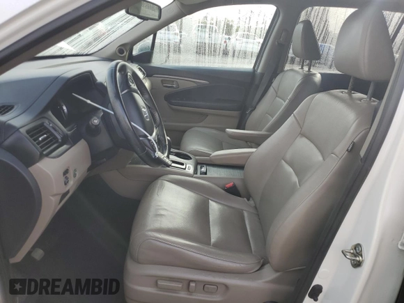 2016 Honda Pilot EX-L with VIN 5FNYF5H71GB034413, listed as a Copart auction lot 50452695 with 118,907 mi miles and Salvage Title. Bid and sale history available at DreamBid. Image 7.