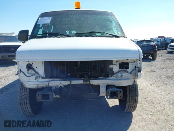 2003 Ford Econoline Cargo Commercial with VIN 1FTNE24L43HB35916, listed as a IAAI auction lot 41526304 with 86,810 mi miles and . Bid and sale history available at carsss.com. Image 6.