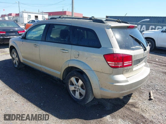 2009 Dodge Journey SXT with VIN 3D4GG57V69T232517, listed as a IAAI auction lot 42039587 with 346,783 mi miles. Bid and sale history available at carsss.com. Image 3.