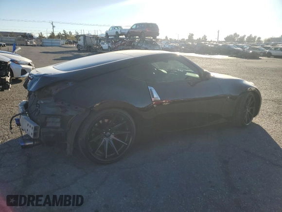 2015 Nissan 370Z Sport with VIN JN1AZ4EH7FM440155, listed as a Copart auction lot 86846404 with 82,330 mi miles and Salvage Title. Bid and sale history available at carsss.com. Image 3.
