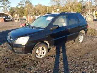 2009 Kia Sportage LX with VIN KNDJE723397585036, listed as a IAAI auction lot 41331868 with 208,268 mi miles and . Bid and sale history available at carsss.com. Image 2.