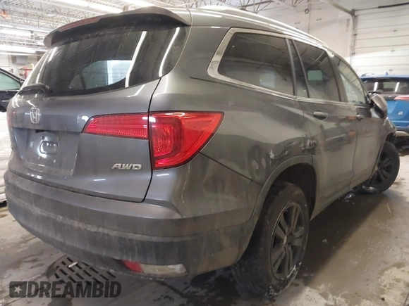 2016 Honda Pilot EX-L with VIN 5FNYF6H75GB104064, listed as a IAAI auction lot 41286959 with 106,263 mi miles. Bid and sale history available at carsss.com. Image 4.