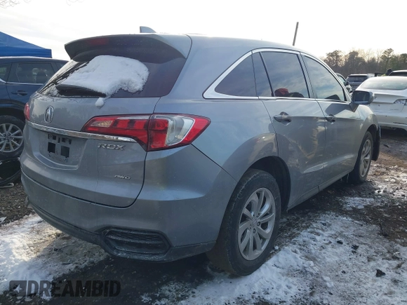 2016 Acura RDX with VIN 5J8TB4H39GL002899, listed as a IAAI auction lot 41384985 with 146,979 mi miles. Bid and sale history available at carsss.com. Image 4.