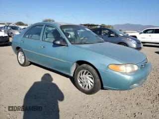 1999 Ford Escort SE with VIN 1FAFP13P5XW177449, listed as a Copart auction lot 82600344 with 237,019 mi miles and Salvage Title. Bid and sale history available at carsss.com. Image 4.