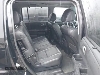 2014 Honda Pilot Touring with VIN 5FNYF4H91EB055741, listed as a IAAI auction lot 42006752 with 222,308 mi miles and . Bid and sale history available at carsss.com. Image 8.