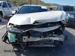 2019 Toyota Avalon XLE z VIN 4T1BZ1FB2KU014289, wystawiony jako IAAI lot #41905789 z przebiegiem 121 906 mil mil oraz . Historia ofert i sprzedaży dostępna na DreamBid. Obrazek 13.