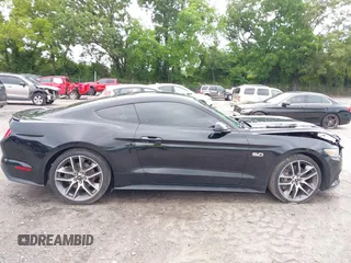 2015 Ford Mustang GT with VIN 1FA6P8CF2F5423037, listed as a IAAI auction lot 42370882 with 149,794 mi miles and . Bid and sale history available at DreamBid. Image 13.