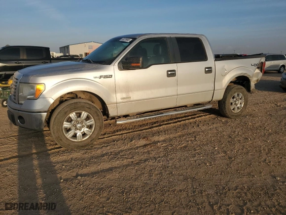 2012 Ford F-150 XL with VIN 1FTFW1ET2CKD41667, listed as a Copart auction lot 50228985 with 286,083 mi miles and Salvage Title. Bid and sale history available at carsss.com. Image 1.