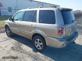2006 Honda Pilot EX-L with RES with VIN 2HKYF186X6H525613, listed as a IAAI auction lot 42077659 with 171,124 mi miles. Bid and sale history available at carsss.com. Image 3.