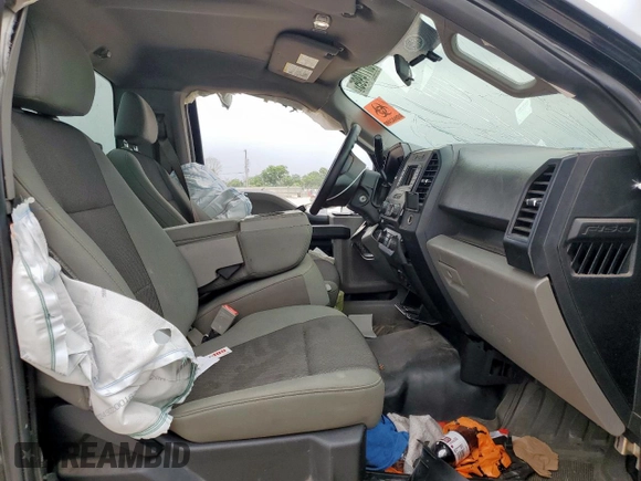 2018 Ford F-150 XL with VIN 1FTMF1CB9JKC79358, listed as a Copart auction lot 57774995 with 112,543 mi miles and Salvage title. Bid and sale history available at DreamBid. Image 7.