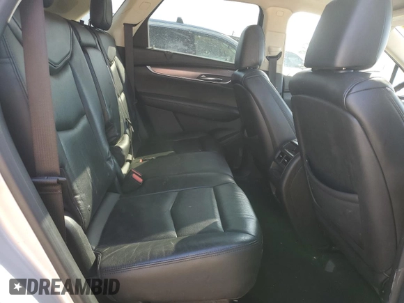 2017 Cadillac XT5 Luxury FWD z VIN 1GYKNBRSXHZ220290, wystawiony jako Copart lot #48578815 z przebiegiem 114 233 mil mil oraz Szkody całkowita. Historia ofert i sprzedaży dostępna na DreamBid. Obrazek 11.