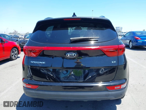 2019 Kia Sportage EX with VIN KNDPN3AC2K7602435, listed as a IAAI auction lot 42233427 with 58,730 mi miles and . Bid and sale history available at DreamBid. Image 16.