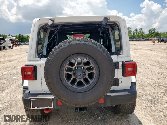 2021 Jeep Wrangler Unlimited Rubicon with VIN 1C4JJXFG1MW849460, listed as a Copart auction lot 62701895 with 54,517 mi miles and Salvage title. Bid and sale history available at DreamBid. Image 6.