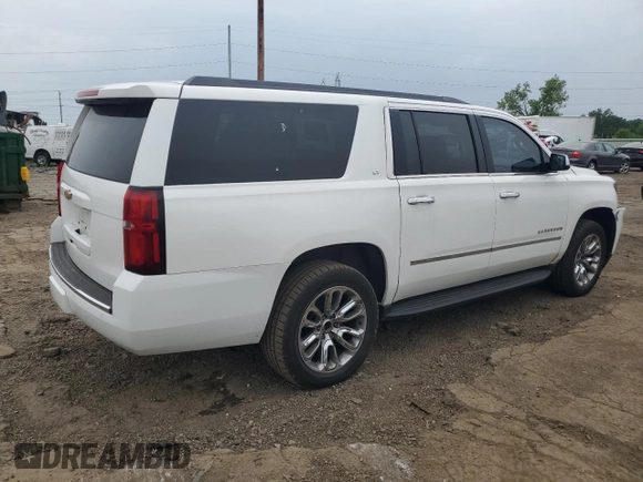 2015 Chevrolet Suburban LT z VIN 1GNSKJKC5FR261474, wystawiony jako Copart lot #60679775 z przebiegiem 128 851 mil mil oraz Czysty tytuł • Clean title. Historia ofert i sprzedaży dostępna na DreamBid. Obrazek 3.