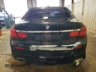 2014 BMW 7 Series ALPINA B7 xDrive with VIN WBAYF8C53ED652566, listed as a Copart auction lot 61177235 with 144,566 mi miles and Salvage title. Bid and sale history available at DreamBid. Image 6.