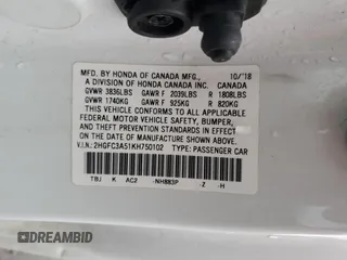 2019 Honda Civic Si z VIN 2HGFC3A51KH750102, wystawiony jako Copart lot #42726255 z przebiegiem 65 824 mil mil oraz Szkoda całkowita • Salvage title. Historia ofert i sprzedaży dostępna na DreamBid. Obrazek 13.