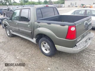 2002 Ford Explorer Sport Trac Value z VIN 1FMZU77E42UC02871, wystawiony jako IAAI lot #42470829 z przebiegiem 151 070 mil mil oraz . Historia ofert i sprzedaży dostępna na DreamBid. Obrazek 3.