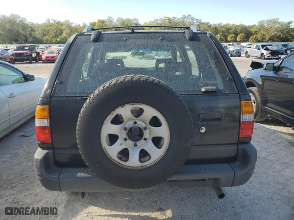 1999 Isuzu Rodeo S with VIN 4S2CK58W7X4357230, listed as a Copart auction lot 85214894 with 130,370 mi miles and Salvage Title. Bid and sale history available at carsss.com. Image 6.