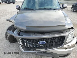 2003 Ford F-150 XL with VIN 2FTRX18L73CA49989, listed as a Copart auction lot 57434025 with 141,876 mi miles and Salvage title. Bid and sale history available at DreamBid. Image 11.