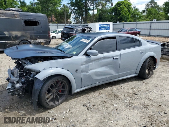 2021 Dodge Charger SRT Hellcat Widebody z VIN 2C3CDXL97MH603070, wystawiony jako Copart lot #57661925 z przebiegiem Nie podano mil oraz Szkoda całkowita • Salvage title. Historia ofert i sprzedaży dostępna na DreamBid. Obrazek 1.