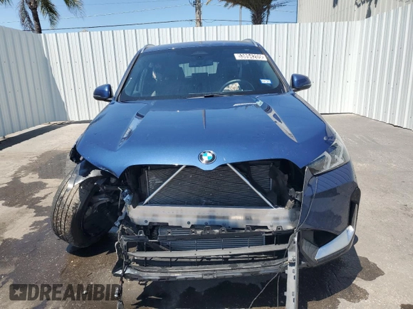 2025 BMW X1 xDrive28i z VIN WBX73EF08S5084278, wystawiony jako Copart lot #53894205 z przebiegiem 15 905 mil mil oraz Nie do naprawy. Historia ofert i sprzedaży dostępna na DreamBid. Obrazek 5.