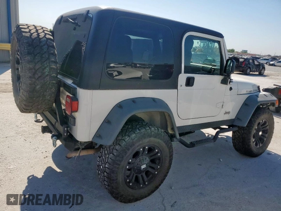 2004 Jeep Wrangler Rubicon z VIN 1J4FA69S34P757352, wystawiony jako Copart lot #52971745 z przebiegiem 139 855 mil mil oraz Szkoda całkowita • Salvage title. Historia ofert i sprzedaży dostępna na DreamBid. Obrazek 3.