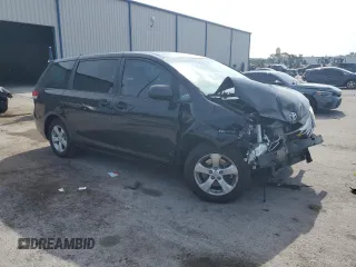 2014 Toyota Sienna L with VIN 5TDZK3DC8ES504985, listed as a Copart auction lot 56174035 with 185,955 mi miles and Salvage title. Bid and sale history available at DreamBid. Image 4.