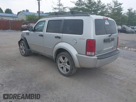 2011 Dodge Nitro Heat with VIN 1D4PU4GK1BW598734, listed as a IAAI auction lot 42498891 with 88,444 mi miles and . Bid and sale history available at DreamBid. Image 3.