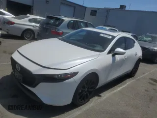 2020 Mazda Mazda3 Hatchback Premium Package with VIN JM1BPANM1L1153202, listed as a Copart auction lot 57854234 with 30,425 mi miles and Salvage Title. Bid and sale history available at carsss.com. Image 1.