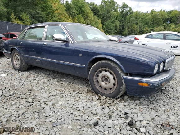 2000 Jaguar XJ VDP with VIN SAJDA24CXYLF13463, listed as a Copart auction lot 67797454 with 144,765 mi miles and Clean Title. Bid and sale history available at carsss.com. Image 4.