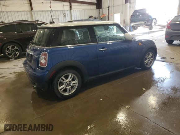 2013 MINI Hardtop with VIN WMWSU3C53DT681665, listed as a Copart auction lot 60752355 with 104,874 mi miles and Salvage title. Bid and sale history available at DreamBid. Image 3.