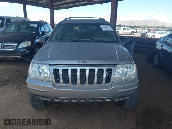 2002 Jeep Grand Cherokee Limited with VIN 1J8GW58J62C165942, listed as a IAAI auction lot 42739339 with 220,677 mi miles and . Bid and sale history available at DreamBid. Image 6.