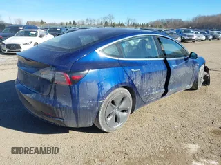 2018 Tesla Model 3 Long Range Battery with VIN 5YJ3E1EA0JF037736, listed as a IAAI auction lot 41423506 with 23,675 mi miles and . Bid and sale history available at DreamBid. Image 4.