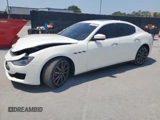 2019 Maserati Ghibli z VIN ZAM57XSA6K1319461, wystawiony jako Copart lot #57321665 z przebiegiem Nie podano mil oraz Tytuł czysty. Historia ofert i sprzedaży dostępna na DreamBid. Obrazek 1.