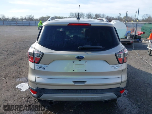 2017 Ford Escape Titanium with VIN 1FMCU0JD3HUB19602, listed as a IAAI auction lot 41816296 with 70,311 mi miles. Bid and sale history available at carsss.com. Image 16.