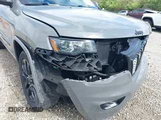 2021 Jeep Grand Cherokee Laredo E with VIN 1C4RJFAG4MC700384, listed as a IAAI auction lot 42192672 with 54,525 mi miles and . Bid and sale history available at DreamBid. Image 19.